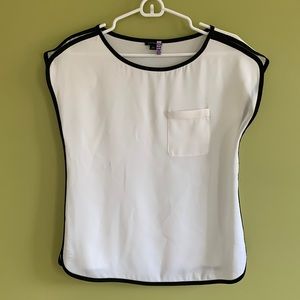 Beautiful Ann Taylor cream and black blouse great for the office or to dress up.